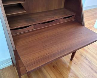 Fold down to make writing surface 