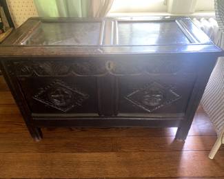 Early 19th Century trunk with coffer carved front