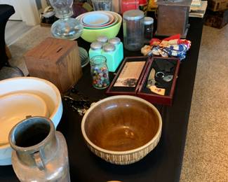 Antique crocks, coffee grinder, kerosene lamp, Pyrex colored nesting bowls; antique bank, misc. vintage books