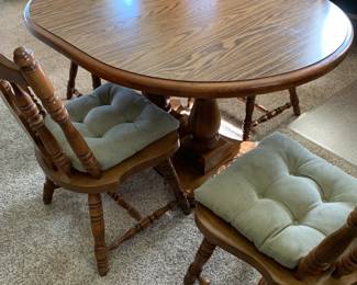 Maple Dining Set with six chairs and 2 extension leaves.