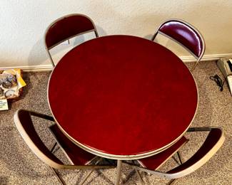 1950's red card table set - round with 4 matching chairs in great condition!