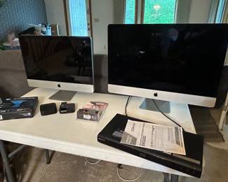 2 Apple computers and several Apple TV's