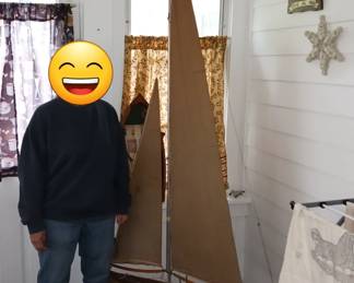 The Happy Person in the Picture Stands 5'5" Tall. This is to show the size of the sailboat.