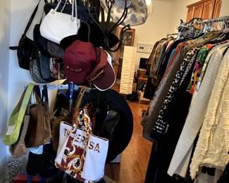 Handbags and new clothes with tags