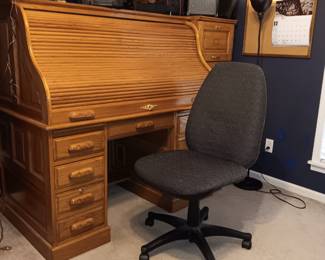 Large roll top desk. Many interior drawers 