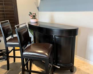 Floating bar with matching barstools.