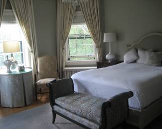 Custom upholstered, headboard, bench, and table