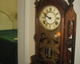 Antique carved wood clock