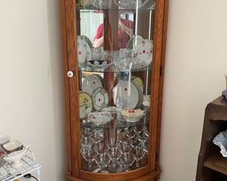 corner chine cabinet with curved-glass door