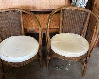 A Pair of Rattan Barrel Chairs