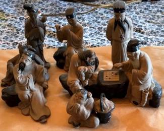 A Collection of Mudmen Figurines