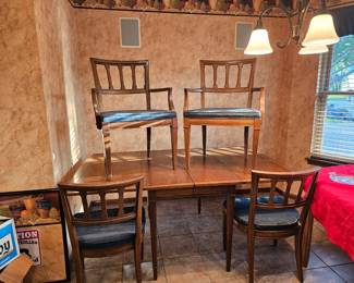 Mid-century Modern dining room, top needs refinishing, table has two leaves