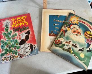 2 Christmas books, the one cover is detached $3.00