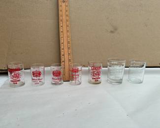 7 Shot Glasses Measuring $18.00