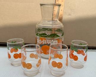 Anchor Hocking Orange Decanter and 7 Glasses $18.00