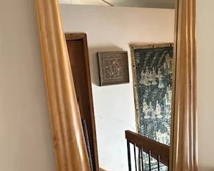 Very interesting mirror with wooden (curtain) frame.