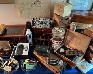 Cigar and pipe supplies including humidors, cutters, pipes, vintage match books, etc.