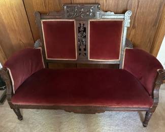 Antique velvet upholstered settee