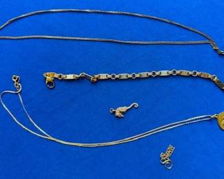 18k star pendant necklace, 18k 2 tone bracelet, 14k sea horse pendant, 18k Lion pendant necklace and 14k pendant.