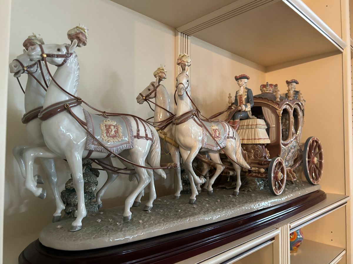 Lladro Limited edition gloss finish porcelain sculpture of a XVIII century carriage drawn by four white horses. $28,000
NOT AT THE STORE still at homeowner home. $27,000