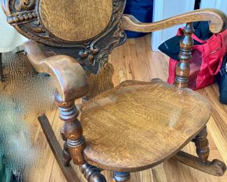 ANTIQUE CARVED ROCKING CHAIR
