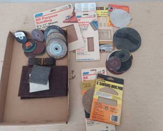 assorted sand paper and discs