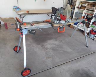 Delta 10in compound miter saw on rolling folding stand