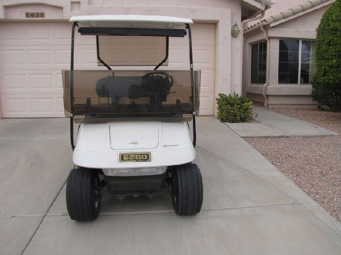 EZ-GO electric golf cart with charging unit, full folding windshield, awesome condition