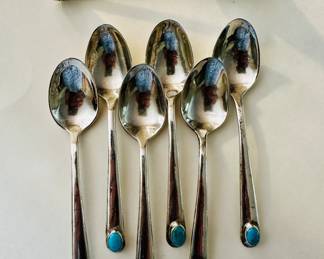 Silver and turquoise tea spoons and candle snuffer