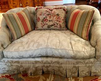 Custom upholstered down filled damask skirted settee (two available)