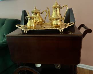 International sterling gold plated service

Tea cart with drop down leaves