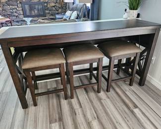 Bar table with matching chairs, power outlets and USB built in