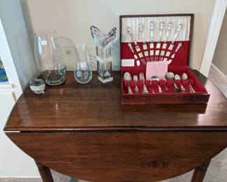 Drop leaf table, vases, and Watson Sterling.