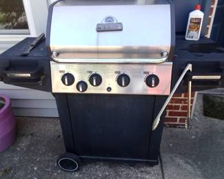 BBQ with side burner works great includes propane and tank.