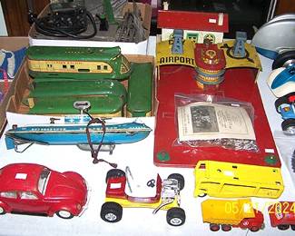 Old toys including Marx M10000 Union Pacific Train, Wolverine wind up sub, Marx airport, Tonka Volkswagen bug, etc...