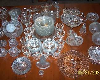 Glassware including Heisey, Christmas ribbon dishes, pressed glass and crystal (Waterford and Gorham)