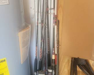 Quite a few fishing poles and tackle