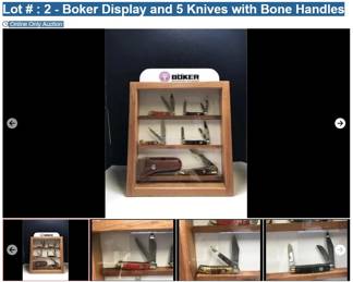 Lot # : 2 - Boker Display and 5 Knives with Bone Handles
Folding Hunter 5" closed, Trapper 3 1/2" closed, Stockman 3 3/4" closed, Trapper 3 3/4" closed and Stockman 3 1/2" closed Blades: one blade of each knife is etched Tree Brand Badge: circle with tree and Solingen Box: all have original and hunter has leather sheath. Wooden Display case has removable back and three shelves. Measures: 13 1/2" x 6" x 16 1/2" tall.
