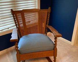 Antique rocker with cane back and very comfy cushion