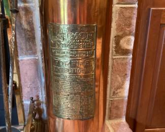 Copper fire extinguisher turned into an umbrella holder