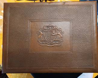 VINTAGE LEATHER STORAGE BOX WITH COAT OF ARMS