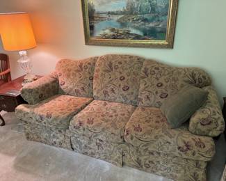 upholstered 3-seat couch // glass lamps // wooden side tables // vintage original oil painting (framed)