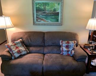 1 of 2 sofas; suede with foot rests; flooe lamp, end table, lamp, original wall art