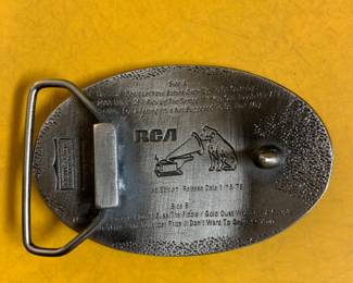 Waylon and Willie belt buckle -backside