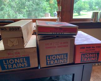 Lionel Trains: switches, transformer, billboard set, news stand with horn. National engine 2037