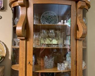 Oak bow front china cabinet
