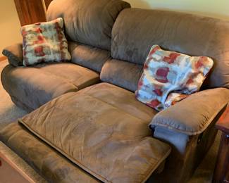 seude sofa with foot rest