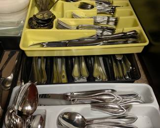 3 sets of stainless flatware