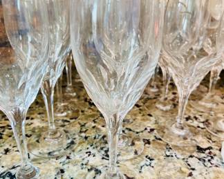 Clear crystal wine glasses with gold rim never been used.
