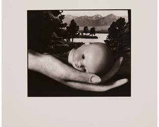 118
Ruth Bernhard
1905-2006
"Creation," 1936
Gelatin silver print on paper mounted to a board mount
Signed in pencil on the mount, at right: Ruth Bernhard; annotated in pencil on a label affixed to the frame's backing paper: Dolls Head
Image/Sheet: 7.5" H x 9.375" W; Mount: 11.75" H x 14" W
Estimate: $3,000 - $5,000